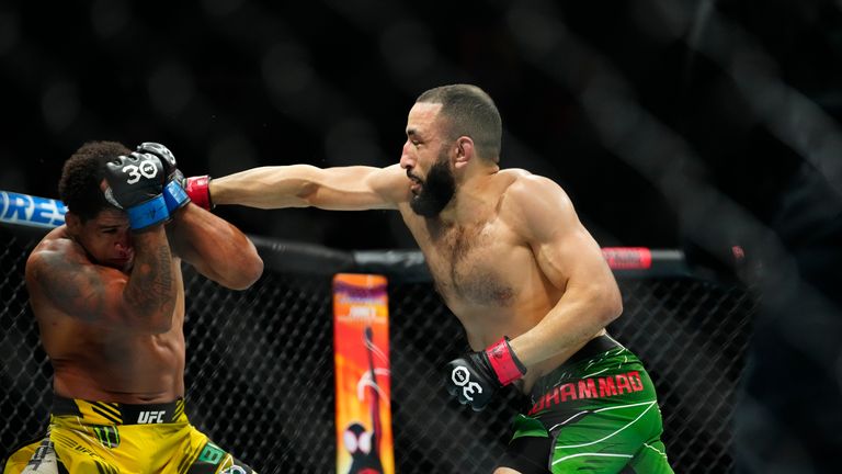 Belal Muhammed punches Gilbert Burns in a Welterweight bout during UFC 288.
