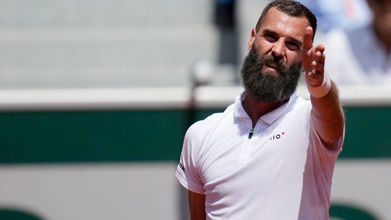 France's Benoit Paire reacts during the first match of the French Open tennis tournament against Britain's Cameron Norrie, at Roland Garros stadium in Paris, Monday, May 29, 2023. (AP Photo/Christophe Ena)