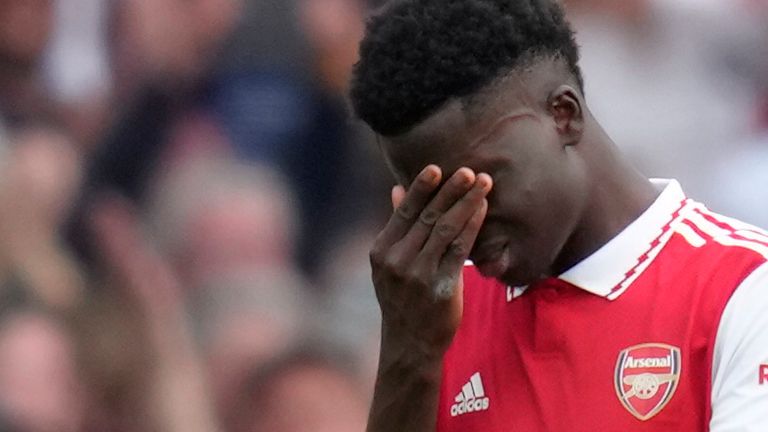 Arsenal's Bukayo Saka reacts after Brighton's Pervis Estupinan scores their third goal in their 3-0 Premier League win at Emirates stadium in London, Sunday, May 14, 2023. (AP Photo/Kirsty Wigglesworth)