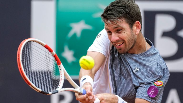 Cameron Norrie of Britain returns the ball to Novak Djokovic of Serbia at the Italian Open tennis tournament, in Rome, Tuesday, May 16, 2023. (AP Photo/Andrew Medichini)