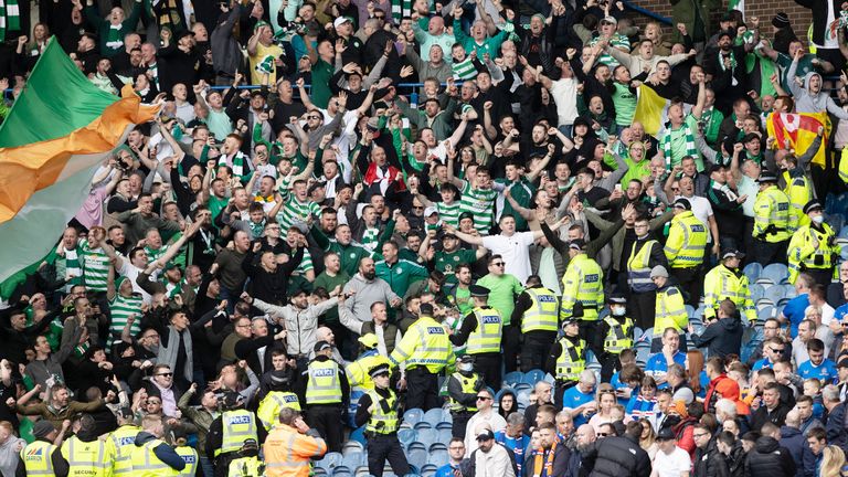 GLASGOW, SCOTLAND - APRIL 03: Celtic fans celebrate during a cinch Premiership match between Rangers and Celtic at Ibrox Stadium, on April 02, 2022, in Glasgow, Scotland.  (Photo by Craig Williamson / SNS Group)