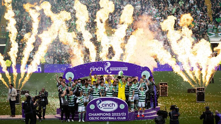 GLASGOW, SCOTLAND - MAY 27: Celtic Captain Callum McGregor lifts the Cinch Premiership Trophy  during a cinch Premiership match between Celtic and Aberdeen at Celtic Park, on May 27, 2023, in Glasgow, Scotland. (Photo by Ross MacDonald / SNS Group)