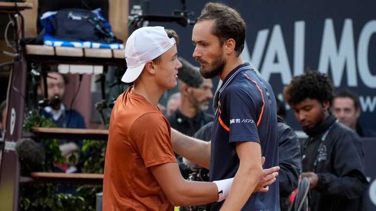Daniil Medvedev of Russia, right, hugs Denmark&#39;s Holger Rune after defeating him in the men&#39;s final tennis match at the Italian Open tennis tournament in Rome, Italy, Sunday, May 21, 2023. (AP Photo/Alessandra Tarantino)