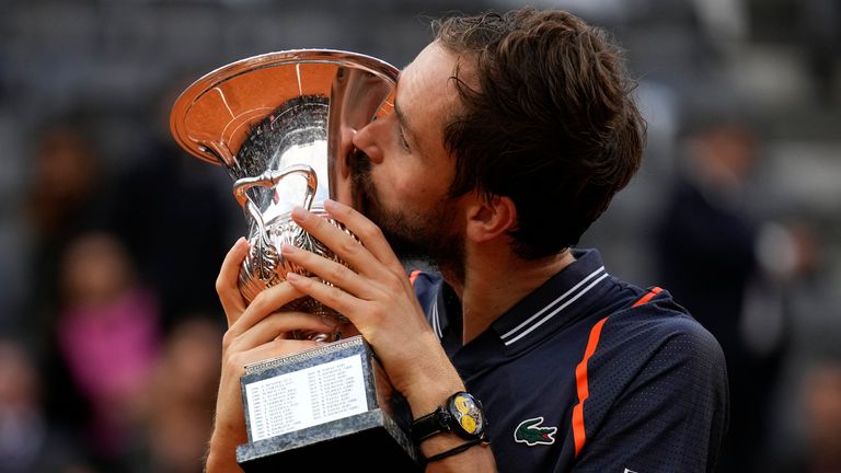 Daniil Medvedev of Russia kisses the trophy after defeating Denmark's Holger Rune during the men's final tennis match at the Italian Open tennis tournament in Rome, Italy, Sunday, May 21, 2023. (AP Photo/Alessandra Tarantino)