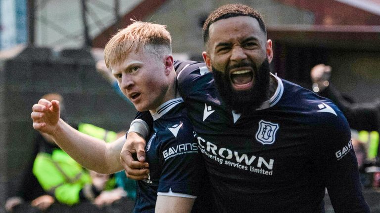 Dundee's Lyall Cameron (L) celebrates scoring to make it 4-3 with Alex Jakubiak during a cinch Championship match between Queen's Park and Dundee at Ochilview Park