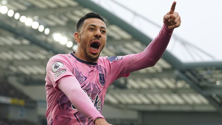 Everton&#39;s Dwight McNeil celebrates after Brighton and Hove Albion goalkeeper Jason Steele scores an own goal