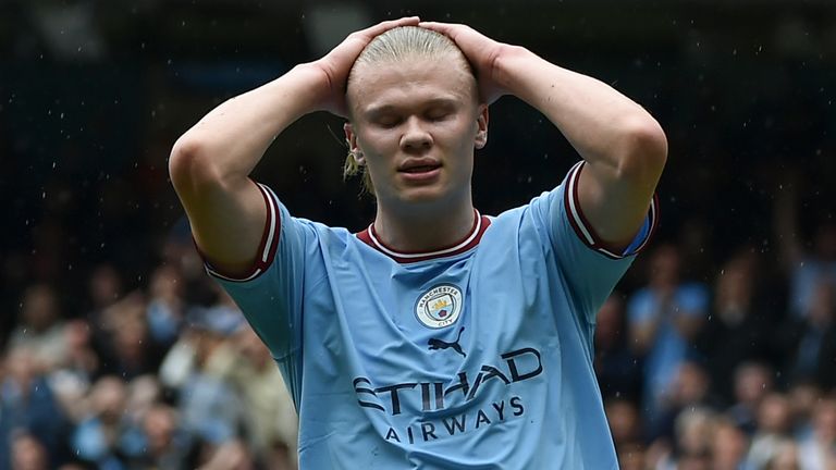 Manchester City&#39;s Erling Haaland reacts after missing an opportunity to score