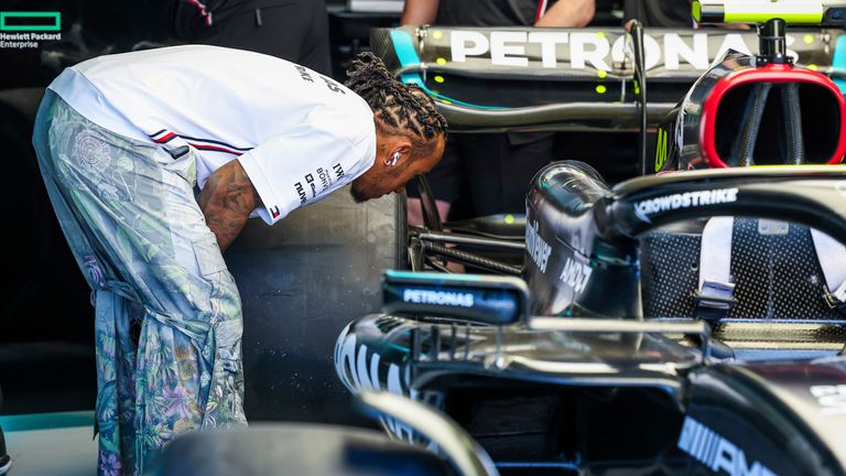 Lewis Hamilton inspects Mercedes' upgraded sidepod design in Monaco