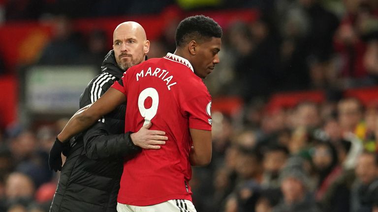 Manchester United's head coach Erik ten Hag greets Manchester United's Anthony Martial after he is being substituted during the English Premier League soccer match between Manchester United and Nottingham Forest at Old Trafford in Manchester, England, Tuesday, Dec. 27, 2022. (AP Photo/Dave Thompson)