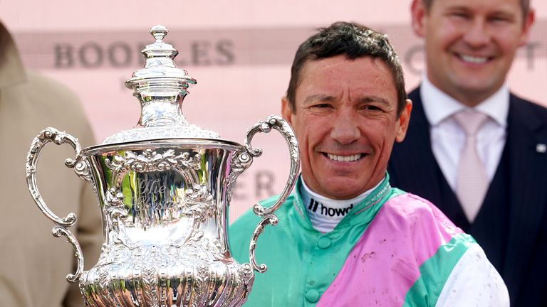 Frankie Dettori poses with the Chester Vase trophy