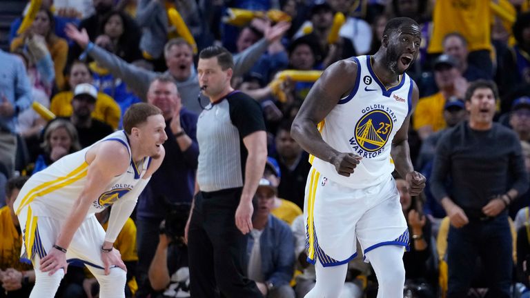 Golden State Warriors forward Draymond Green (23) reacts next to guard Donte DiVincenzo during the second half of Game 5 of the team's NBA basketball second-round playoff series against the Los Angeles Lakers on Wednesday, May 10, 2023, in San Francisco.
