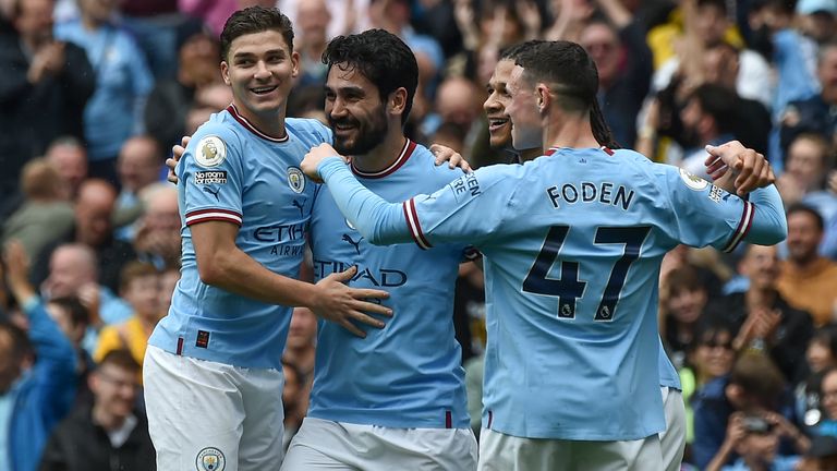Manchester City's Ilkay Gundogan celebrates with team-mates after scoring his second goal