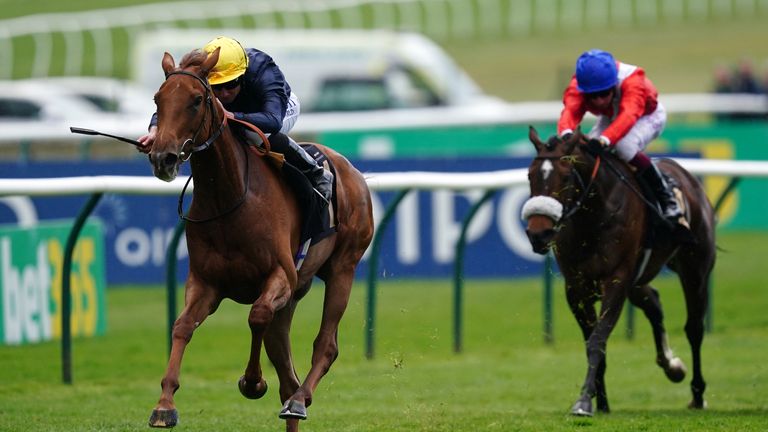 Infinite Cosmos ridden by Ryan Moore (left) on the way to winning the Nyetimber Maiden Fillies' Stakes