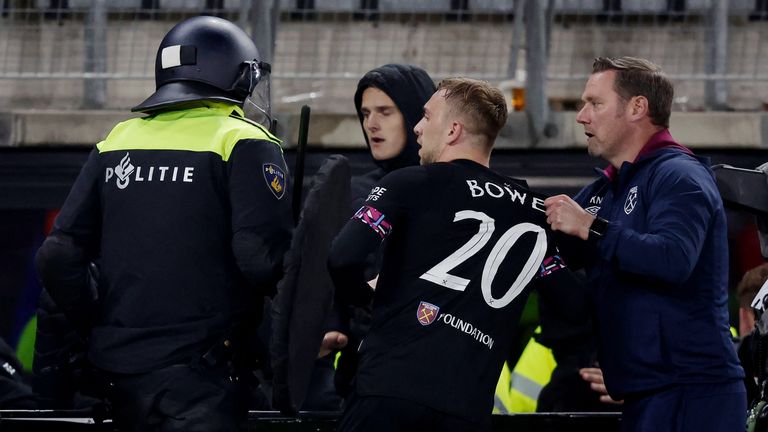 Jarrod Bowen is held back after violence mars West Ham's win over AZ Alkmaar