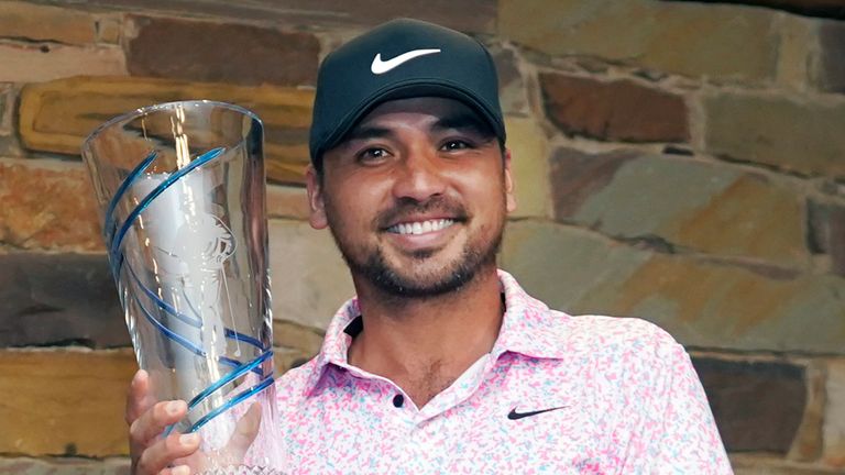 Jason Day, of Australia, poses for photos with the trophy after winning the Byron Nelson golf tournament in McKinney, Texas, Sunday, May 14, 2023. (AP Photo/LM Otero)