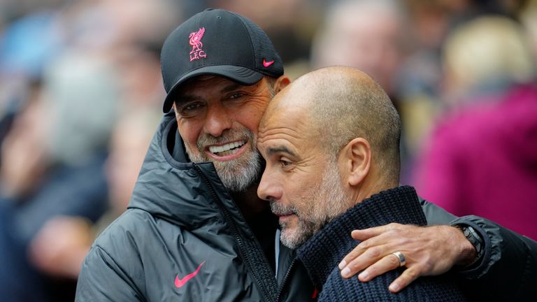 Liverpool&#39;s manager Jurgen Klopp, left, greets Manchester City&#39;s head coach Pep Guardiola prior to the English Premier League soccer match between Manchester City and Liverpool at Etihad stadium in Manchester, England, Saturday, April 1, 2023.