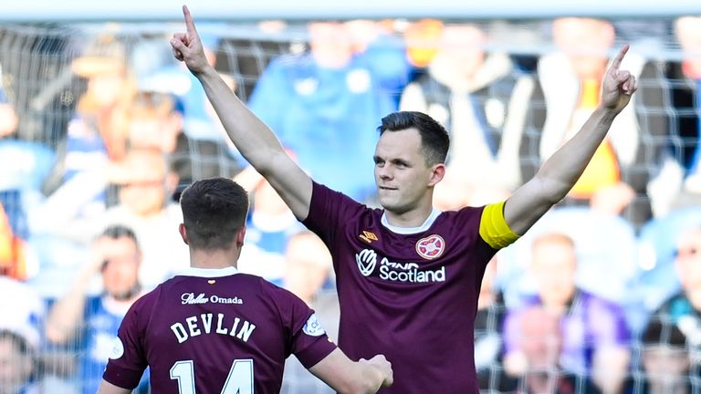 Hearts&#39; Lawrence Shankland celebrates as referee John Beaton awards the goal after a VAR check to make it 1-0 vs Rangers