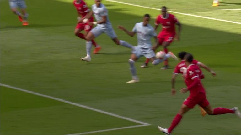 Konsa blocks Diaz's header and the ball bounces to Van Dijk