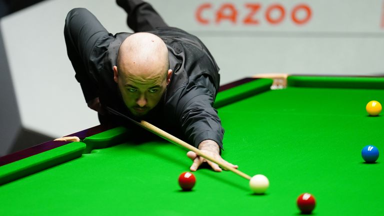Luca Brecel holds a 9-8 lead over Mark Selby heading into the concluding day of the final