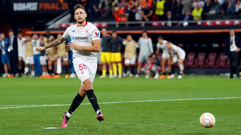 Sevilla's Lucas Ocampos scores from the spot in the Europa League final