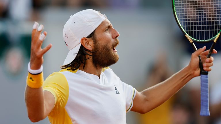 France&#39;s Lucas Pouille reacts after missing a shot against Austria&#39;s Jurij Rodionov during their first round match of the French Open tennis tournament at the Roland Garros stadium in Paris, Sunday, May 28, 2023. (AP Photo/Jean-Francois Badias)
