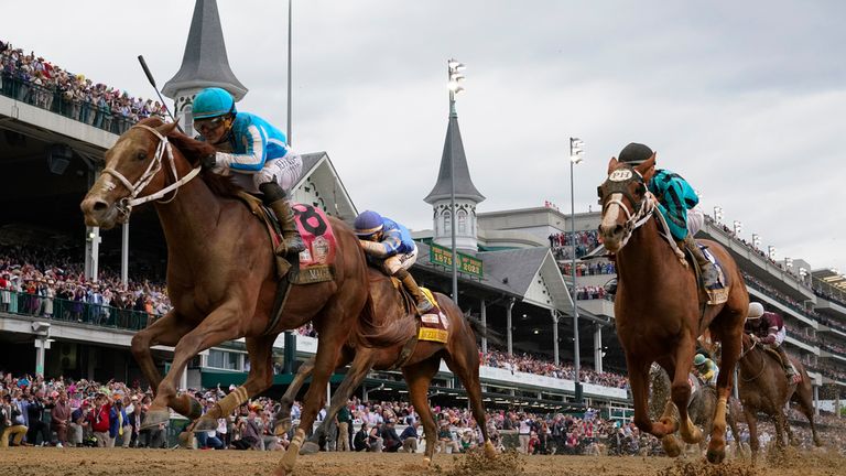 Mage (8), with Javier Castellano aboard, wins the Kentucky Derby at Churchill Downs