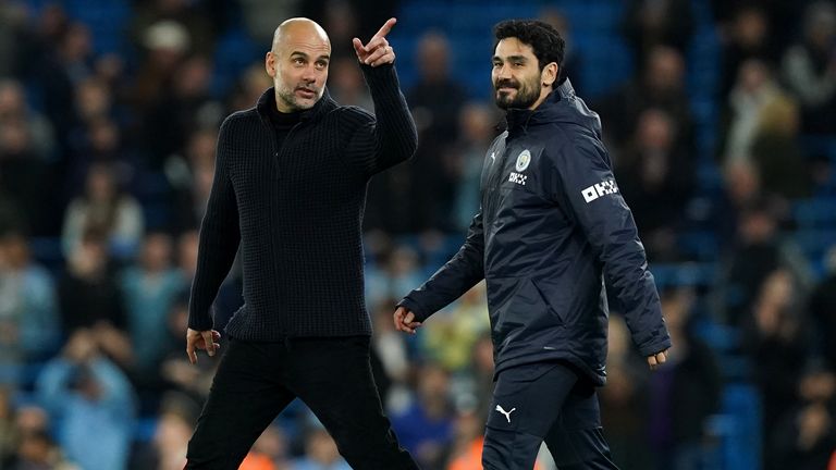 Manchester City manager Pep Guardiola speaks with Ilkay Gundogan after the final whistle following the Premier League match at the Etihad Stadium, Manchester. Picture date: Wednesday May 3, 2023.