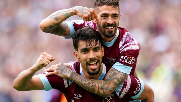 West Ham United's Manuel Lanzini (top) celebrates with team-mate Lucas Paqueta after scoring their side's third goal of the game