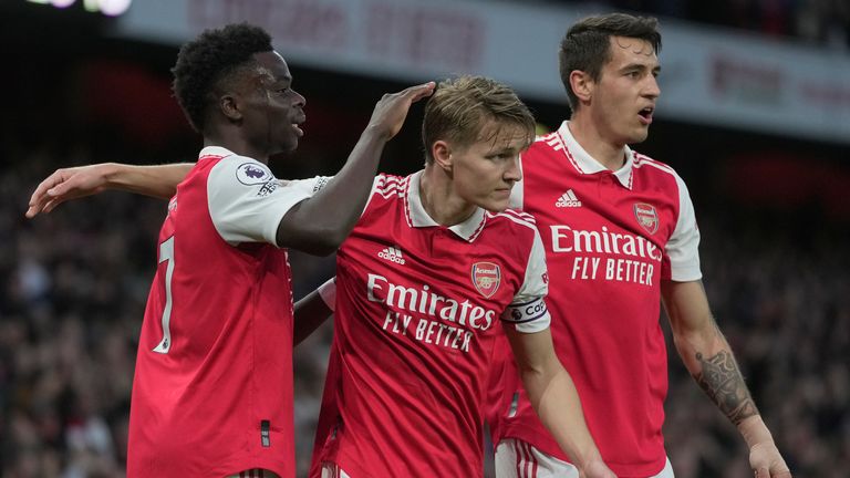 Arsenal&#39;s Martin Odegaard, centre, celebrates after scoring his side&#39;s opening goal vs Chelsea