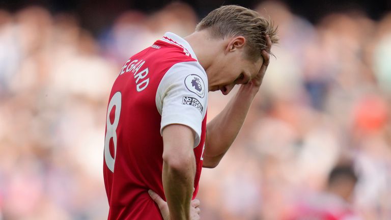 Arsenal's Martin Odegaard reacts during the English Premier League soccer match between Arsenal and Brighton and Hove Albion at Emirates stadium in London, Sunday, May 14, 2023. (AP Photo/Kirsty Wigglesworth)