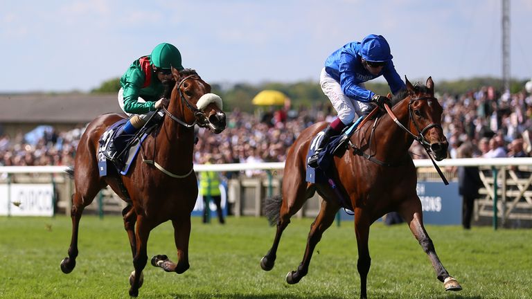 Mawj (right) fights off the challenge of Tahiyra to win the Qipco 1000 Guineas at Newmarket