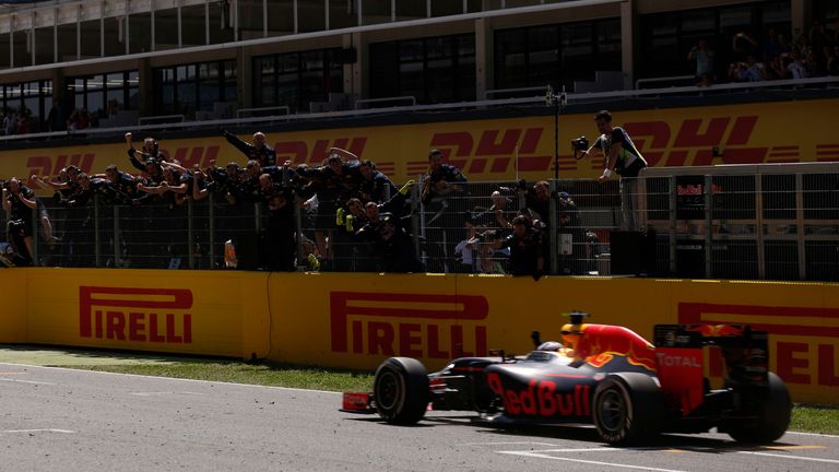 Circuit de Catalunya, Barcelona, Spain. .Sunday 15 May 2016..Max Verstappen, Red Bull Racing RB12 TAG Heuer is cheered by his team as he crosses the finish to win the Spanish Grand Prix..World Copyright: Sam Bloxham/LAT Photographic.ref: Digital Image _R6T0345
