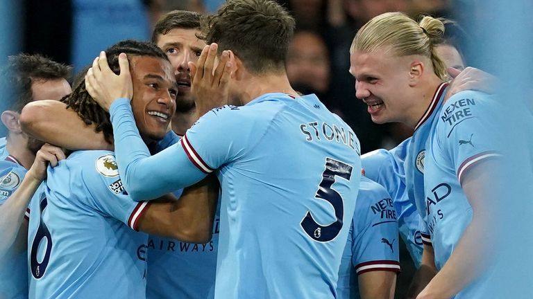 Nathan Ake celebrates his goal for Man City against West Ham with his team-mates