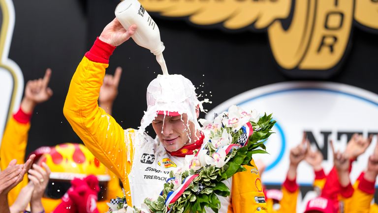 Josef Newgarden celebrates after winning the 107th Running of the Indy 500