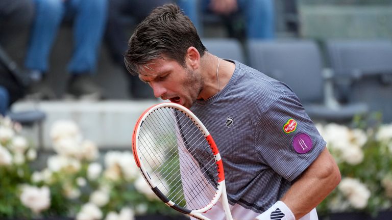 Cameron Norrie of Britain reacts after losing a point to Novak Djokovic of Serbia at the Italian Open tennis tournament, in Rome, Tuesday, May 16, 2023. (AP Photo/Andrew Medichini)