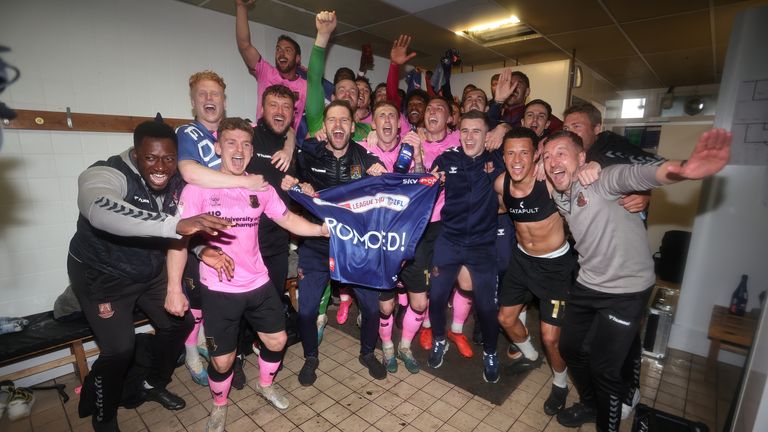 Northampton Town players celebrate promotion