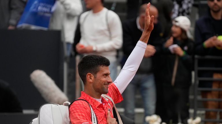 Serbia's Novak Djokovic leaves at the end of the quarter final match against Denmark's Holger Rune at the Italian Open tennis tournament, in Rome, Wednesday, May 17, 2023. (AP Photo/Gregorio Borgia)