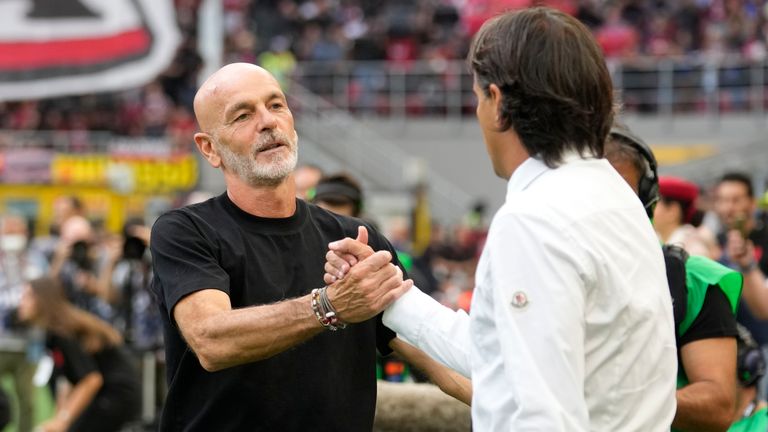 AC Milan's manager Stefano Pioli, left, and Inter Milan's manager Simone Inzaghi