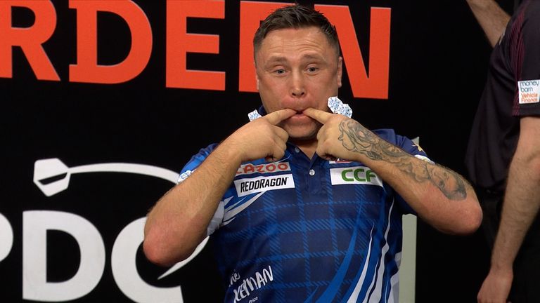 Gerwyn Price gives some stick to a whistler in the crowd