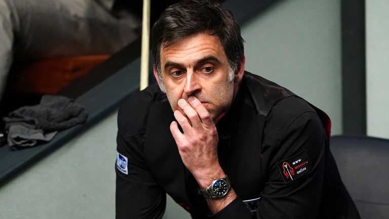 Ronnie O'Sullivan reacts during his match against Luca Brecel at the World Snooker Championship on April 26