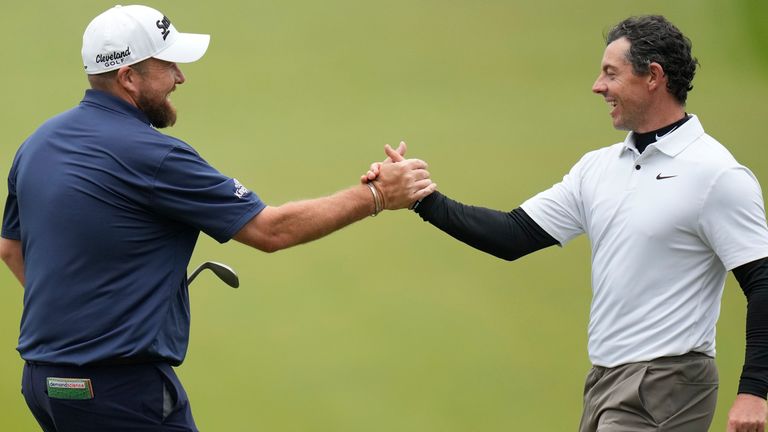 Shane Lowry (left) carded a third-round 71 alongside McIlroy to sit inside the top-10 