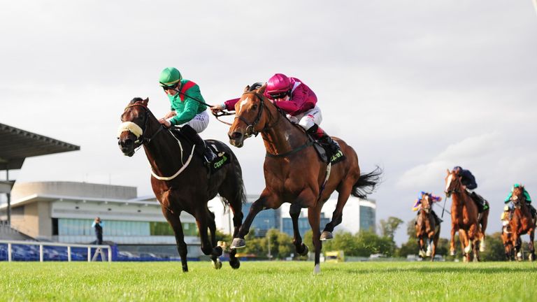 Colin Keane on board Safe Voyage (right) on their way to winning the Clipper Logistics Boomerang Mile
