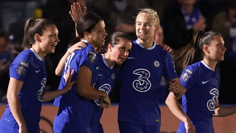 Sam Kerr celebrates her late winner for Chelsea against Liverpool in the Women&#39;s Super League with her team-mates