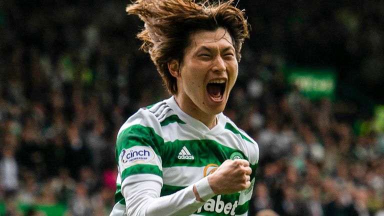 Kyogo Furuhashi celebrates after doubling Celtic's lead against Aberdeen