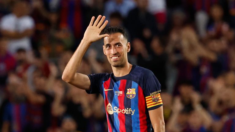 Barcelona's Sergio Busquets waves to fans after his last home game of the season for the club at the end of a Spanish La Liga soccer match between Barcelona and Mallorca at the Camp Nou stadium in Barcelona, Spain, Sunday, May 28, 2023. (AP Photo/Joan Monfort)