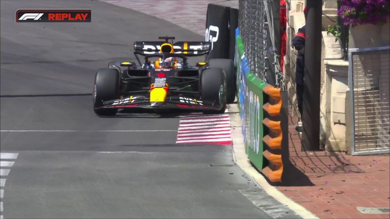 Max Verstappen kisses the barriers in P3