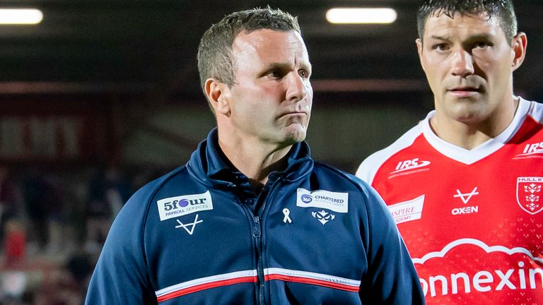 Picture by Allan McKenzie/SWpix.com - 25/05/2023 - Rugby League - Betfred Super League Round 13 - Hull KR v Wigan Warriors - Sewell Group Craven Park, Hull, England - Hull KR's coach Willie Peters & Ryan Hall leave the field dejected after their side's Golden Point loss to Wigan