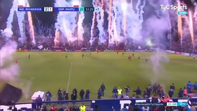 Chaos as Argentinean fans let off fireworks in the stadium on the final whistle 