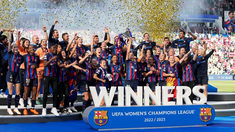 Barcelona's captain Alexia Putellas lifts the trophy after winning the Women's Champions League final 3-2 against Wolfsburg