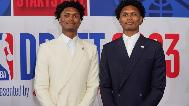Amen Thompson, left, and Ausar Thompson arrive at Barclays Center before the NBA basketball draft, Thursday, June 22, 2023, in New York. (AP Photo/John Minchillo)